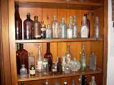 Many more vintage bottles