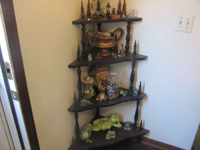 Antique corner shelf with frogs