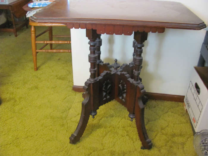 Antique carved accent table