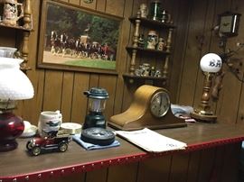 Mantle clock, Bar lamp, Man cave stuff