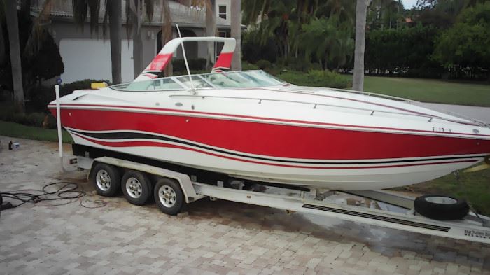 29 foot 1995 Baja Boat 290 offshore with 2 Bravo one out drive mercury and 2015 aluminum tri-axe trailer 