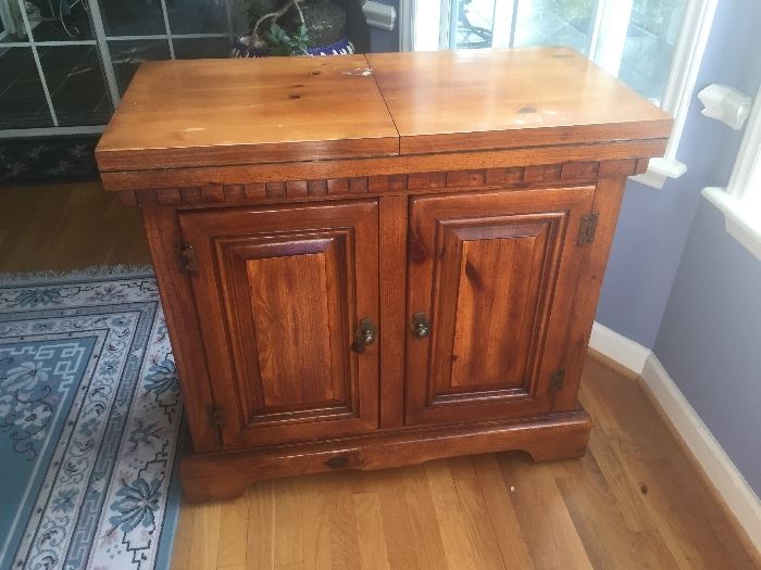 This turns Into a handy sideboard , 
Made by Colonial Pine