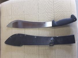 Knife with leather sheath cover.