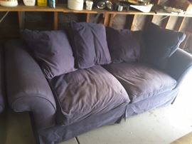 7 Foot Blue Fabric Couch - overstuffed pillows.