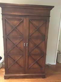 Tall Armoire with Cross Pattern, this cabinet is over 8 foot tall. Used for Media Systems.