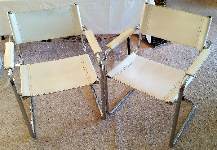 Pair of vintage sling seat chairs.