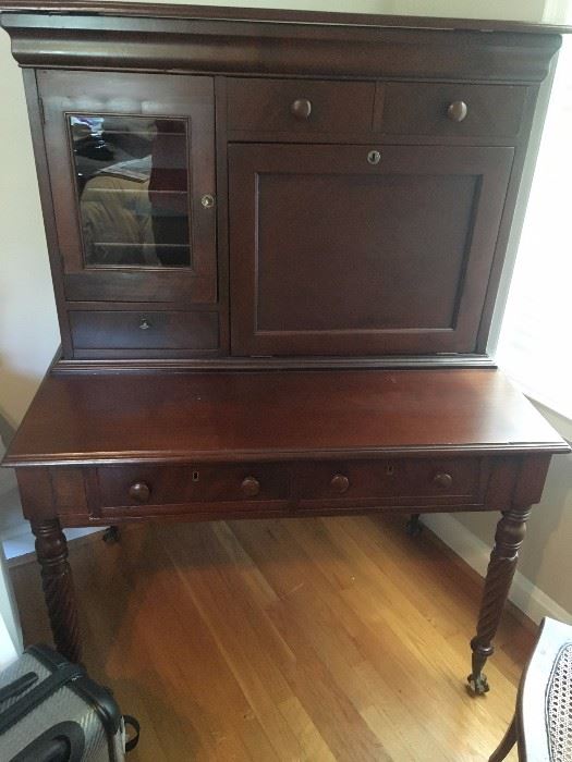 Antique mahogany writing desk when everything is closed up