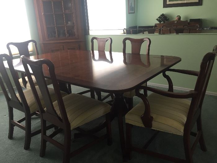 Kittinger olive burl table with mahogany inlay                      6 chairs, 2 leaves and pads    $6500                                               This item can be presold at full asking price