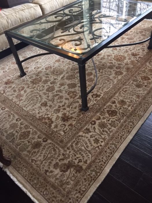 Ethan Allen wrought iron table with glass top and wool area rug (approx 5x8)