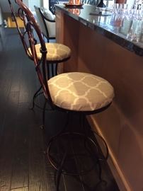 Pair of iron bar stools.
