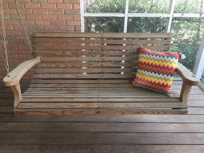Wooden porch swing in excellent condition