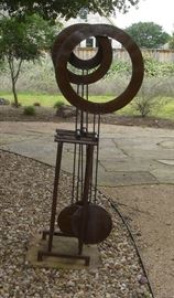 Outdoor kinetic metal sculpture