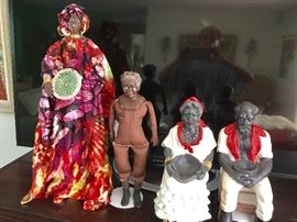 Nigerian doll, Black Americana doll and two finely detailed Cuban Santinas: Papa Francisco and Mama Francisca.