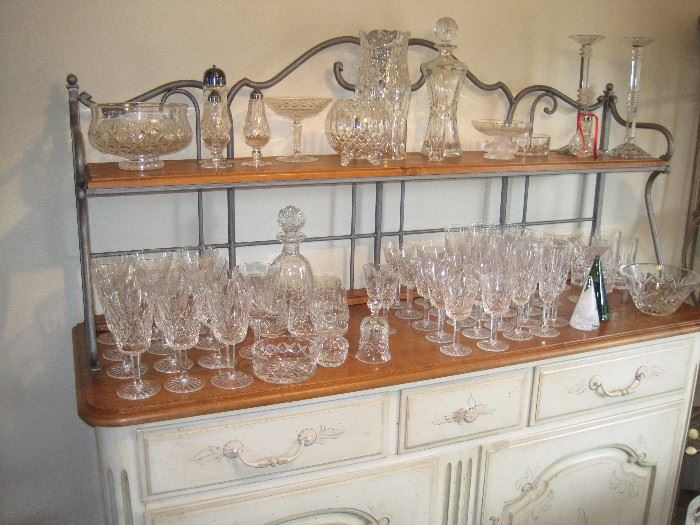 Ethan Allen sideboard. Waterford, Lalique and Kosta Boda crystal.