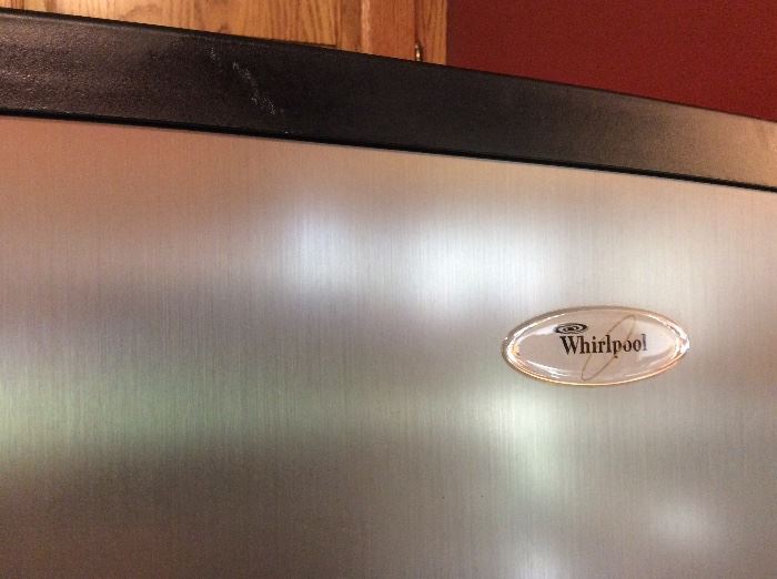 Stainless steel Whirlpool refrigerator/freezer with ice maker