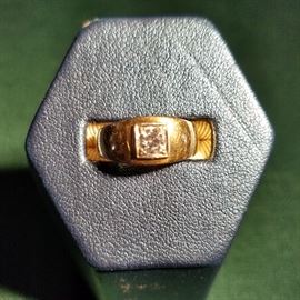 18k gold and diamond ring. Diamond estimated at .33  (1/3) carat