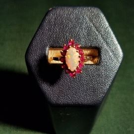 Opal & Ruby ring set in gold