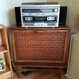 Mid-century modern record storage cabinet.  On top, vintage stereo with turntable....all in working order.  Play your vinyl on this!