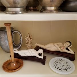 Wood item to left is early stethoscope. Dr. Ladies are from an earlier era where a woman would show the doctor "where it hurt".  