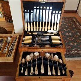 Set of English silverplate flatware set in fitted case. (One knife blade damaged)  Set for 6.