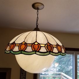 Hanging fixture with leaded glass upper shade, and molded glass lower bowl.