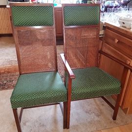 The two chairs with losses to the caning on their backs.  