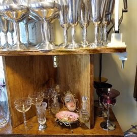 Pewter stems, Glass stems, French dresser piece with perfume bottles and a hook for holding a watch.