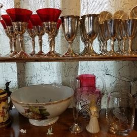 Red goblets with sterling bases, Pewter stems, Porcelain punch bowl, Rubina "Leaf" pitcher, Murano angel, etc.