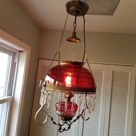 Cranberry hanging lamp.  NOTE:  Glass is NOT period, but is of later manufacture.  Electrified.