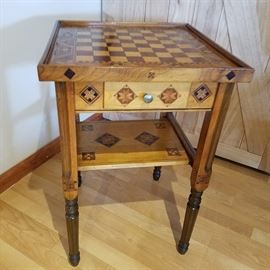 Folk Marquetry game table with detailed inlay.