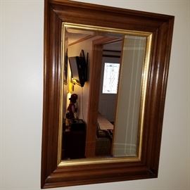 Beveled mirror in walnut frame