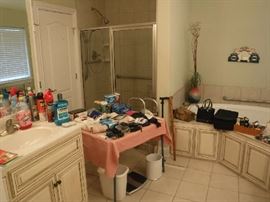 A few bathroom items all in like new condition including a few canes and a walker. We also have a Jazzy Electric wheelchair in the garage that's been plugged in to be ready to try on sale day