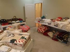 Many very different Afghans, comforters, a couple nice quilts and lots of bedding!