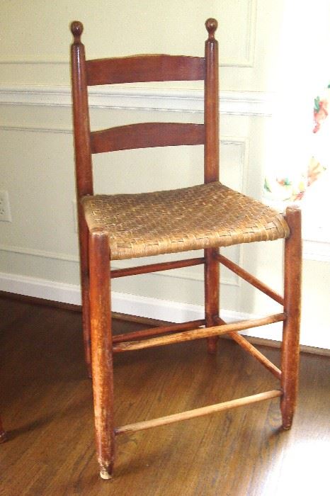 Original and authentic Shaker high chair with rush seat.