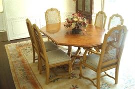Henredon dining table and six chairs.