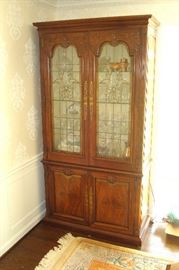 One of a pair of Henredon china cabinets with beautiful leaded glass doors.