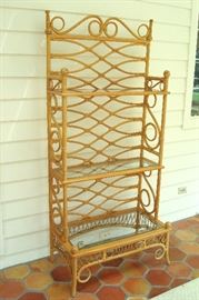 Vintage rattan bakers rack.
