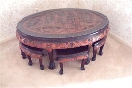 Oriental carved low table and benches.