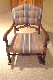 Vintage upholstered rocking chair.