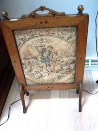 Antique oak fire screen.