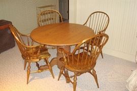 Oak round pedestal table and set of Hickory Windsor chairs.  ( chairs & table sold separately)
