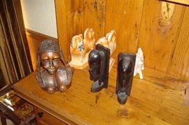 Antique African carved figurine and bookends.