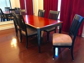 Rectangular Dining Room table, cherry inlayed top, black finish on the bottom, with 6 chairs, 1 leaf