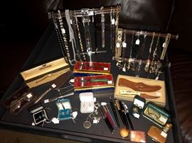 Costume jewelry, knives, compacts, sterling
