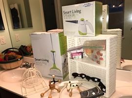 Brand new in the box Smart Living floor and hand steamers 