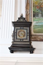 German mantel clock with brass accents
