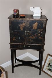 Vintage asian-themed cabinet on legs 
