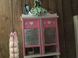 Crochet doll on bathroom cabinet