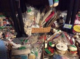 Embroiderery cotton thread in several colors, baskets, pin cushions