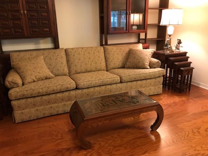 Mid Century Sofa shown with Asian coffee table and one of two sets of Asian nesting tables